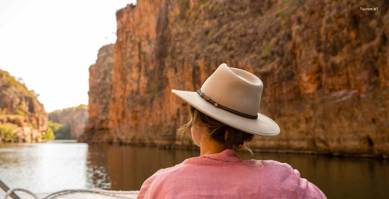 Woman sitting on river cruise boat