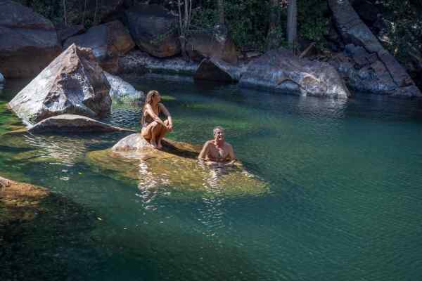 Two people enjoying Motor Car Falls in Kakadu